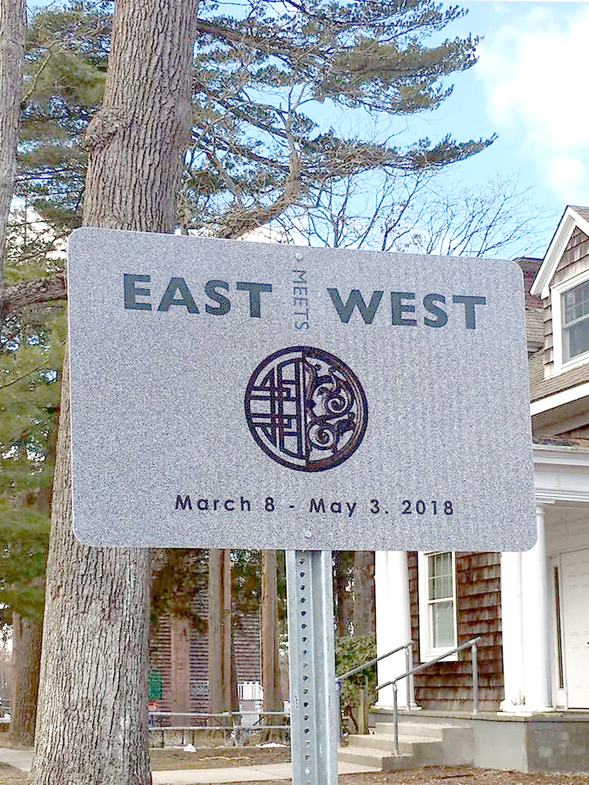 East Meets West exterior signage